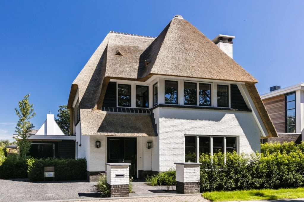 Rietgedekte villa bouwen Hooglanderveen